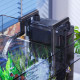 Sunsun HBL-803 installe sur le bord d'un aquarium plante