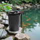 Filtre Sunsun CPF-30000 installe au bord d'un grand bassin de jardin avec carpes koi et nenuphars